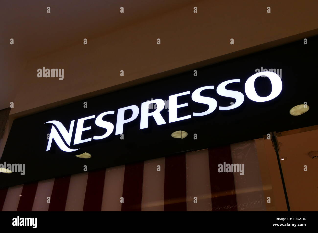 RIYADH, SAUDI ARABIA - DECEMBER 16, 2018: The logo of the brand Nespresso Stock Photo