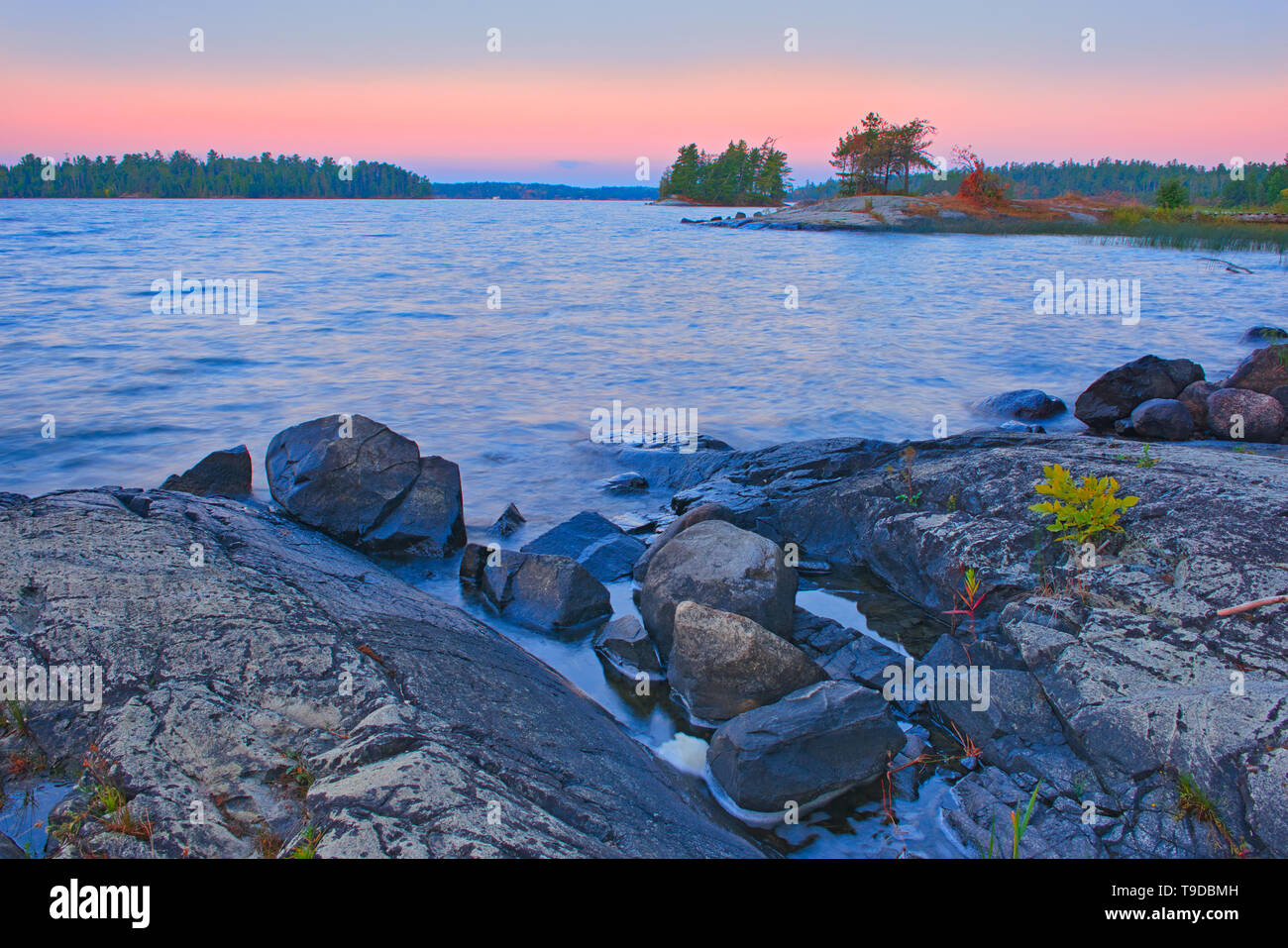 Dawn on shore of Lake of The Woods Sioux Narrows Provincial Park Ontario Canada Stock Photo