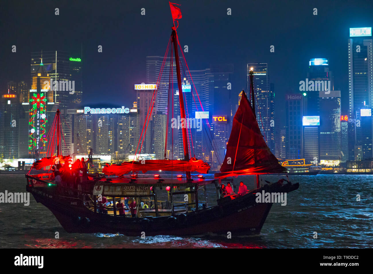 Tourist junk at night, Victoria Harbour, Hong Kong, SAR, China Stock Photo