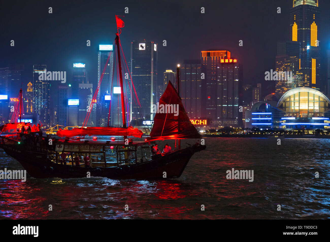 Tourist junk at night, Victoria Harbour, Hong Kong, SAR, China Stock Photo
