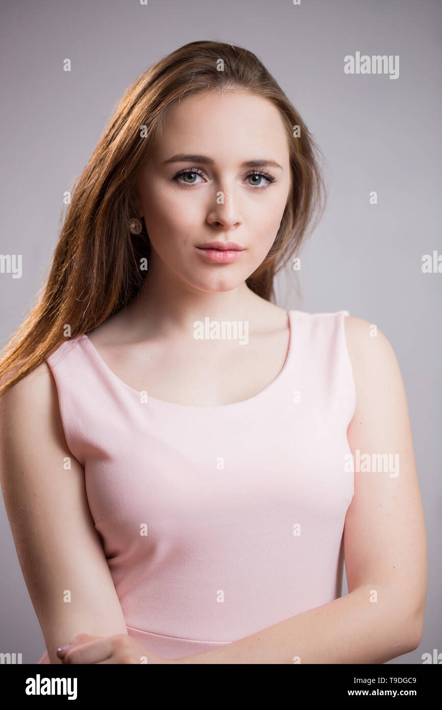 Close up portrait of beautiful young women with long hair and no makeup ...