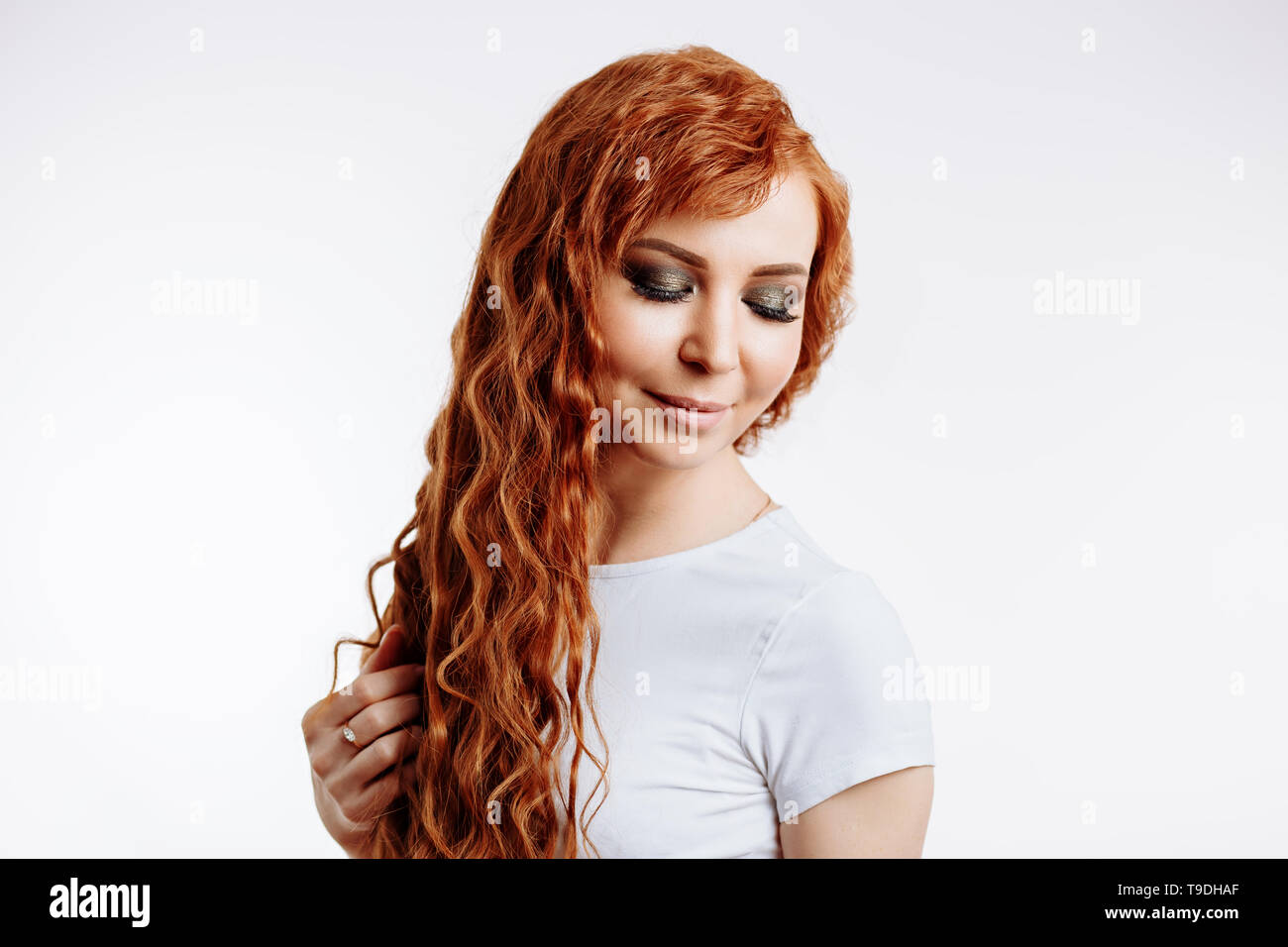Beautiful Calm Ginger Womanl Smiling With Closed Eyes
