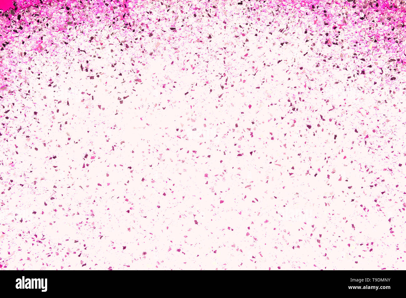 Bright multi colored pink with blue pebbles background for text Stock Photo