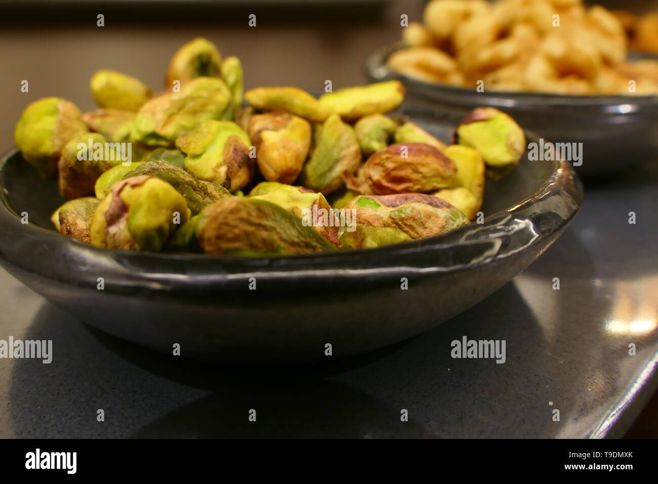 A Bowl with pistachios Stock Photo