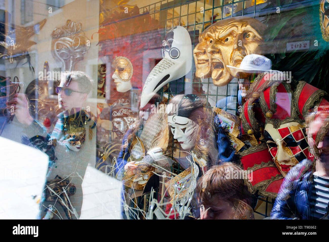 Venetian masks and reflections. Stock Photo