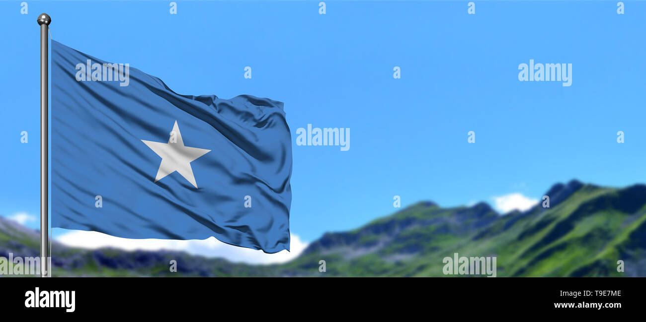 Somalia flag waving in the blue sky with green fields at mountain peak
