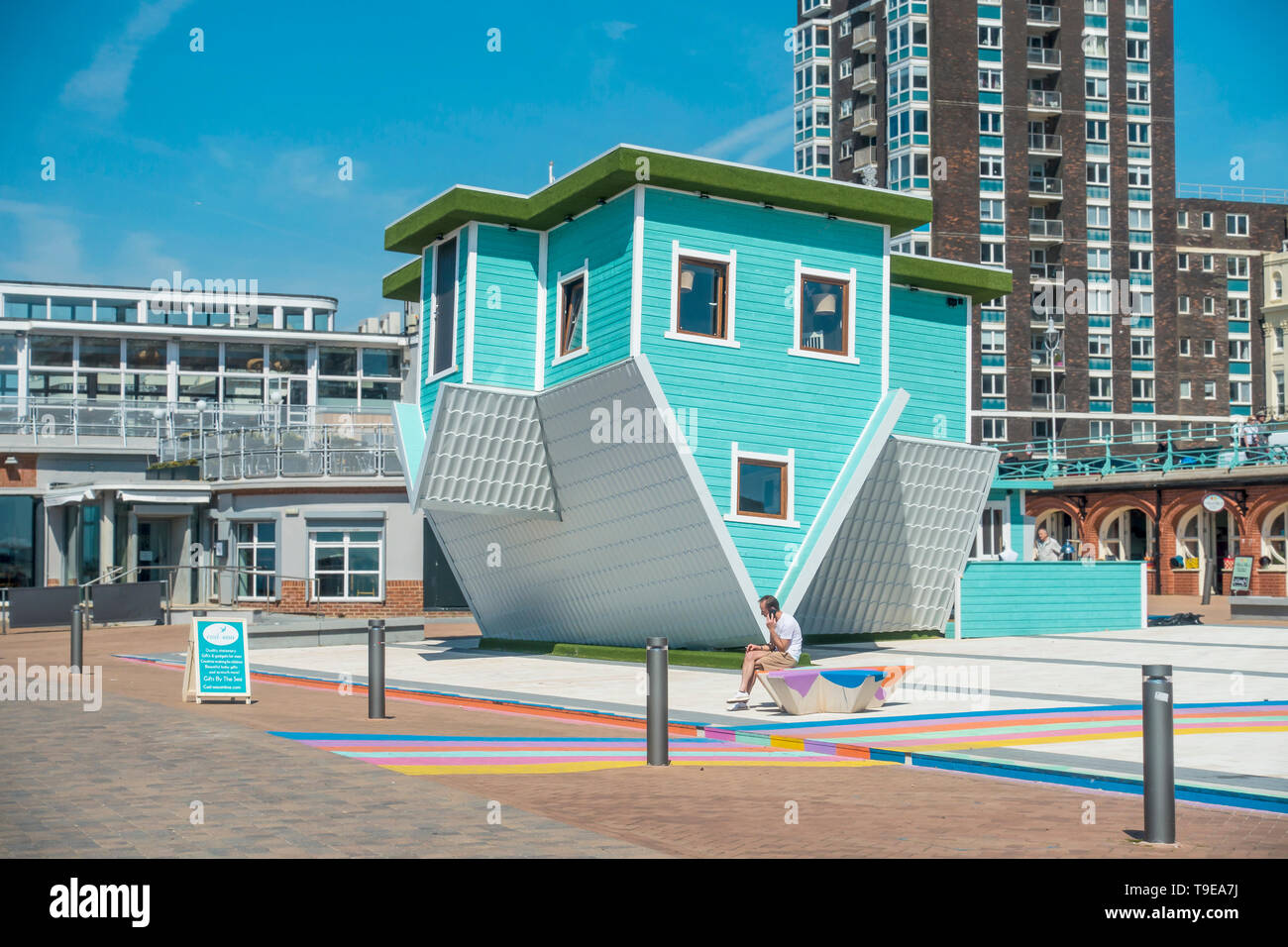 Upside Down House,Brighton,Seafront,Sussex Brought to Brighton by 25-year-old Tom Dirse, CEO of Upside Down House UK. Stock Photo