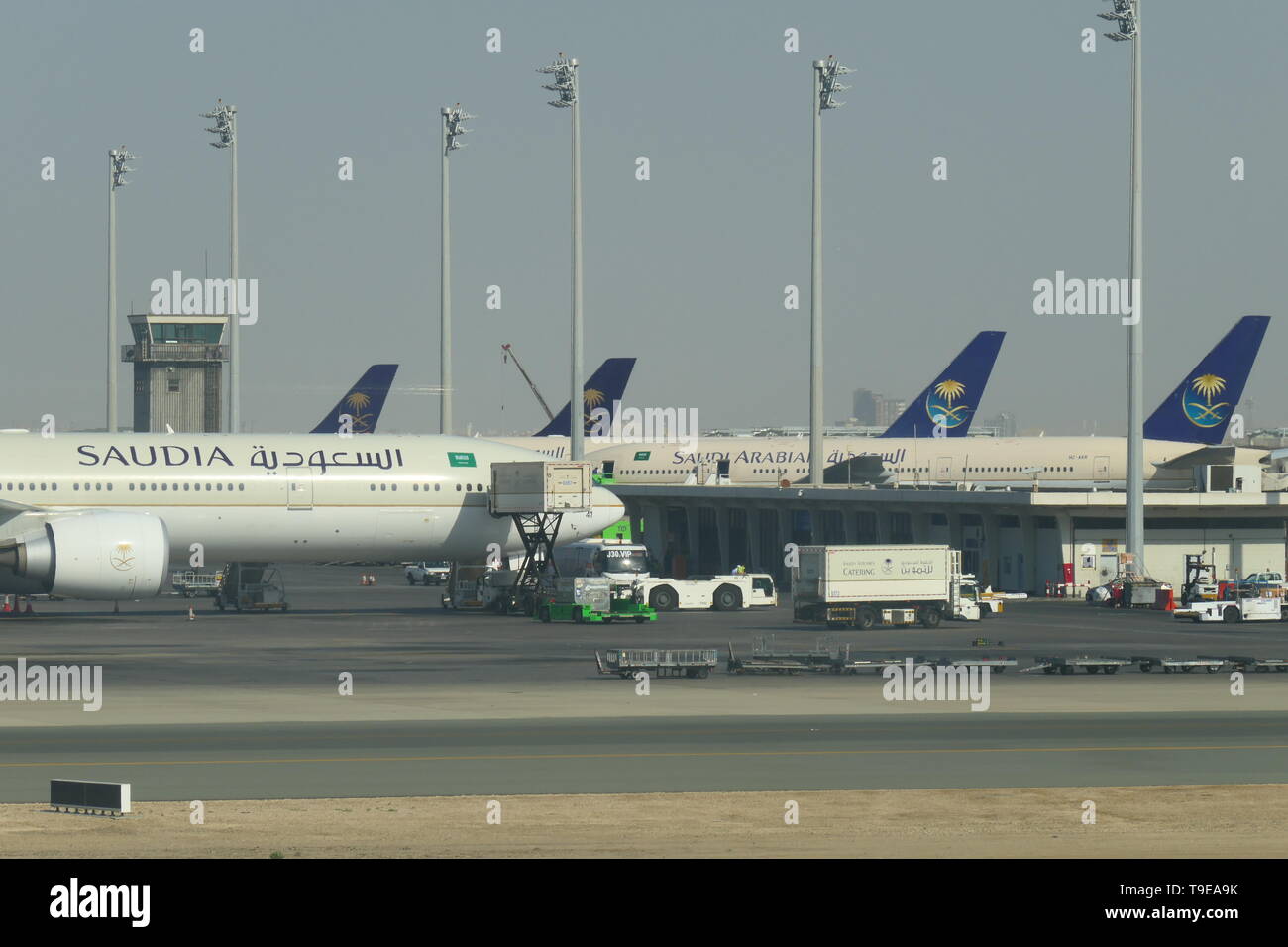 JEDDAH, SAUDI ARABIA - DECEMBER 22, 2018: Multiple SAUDIA Airplanes on the King Abdulaziz International Airport Stock Photo
