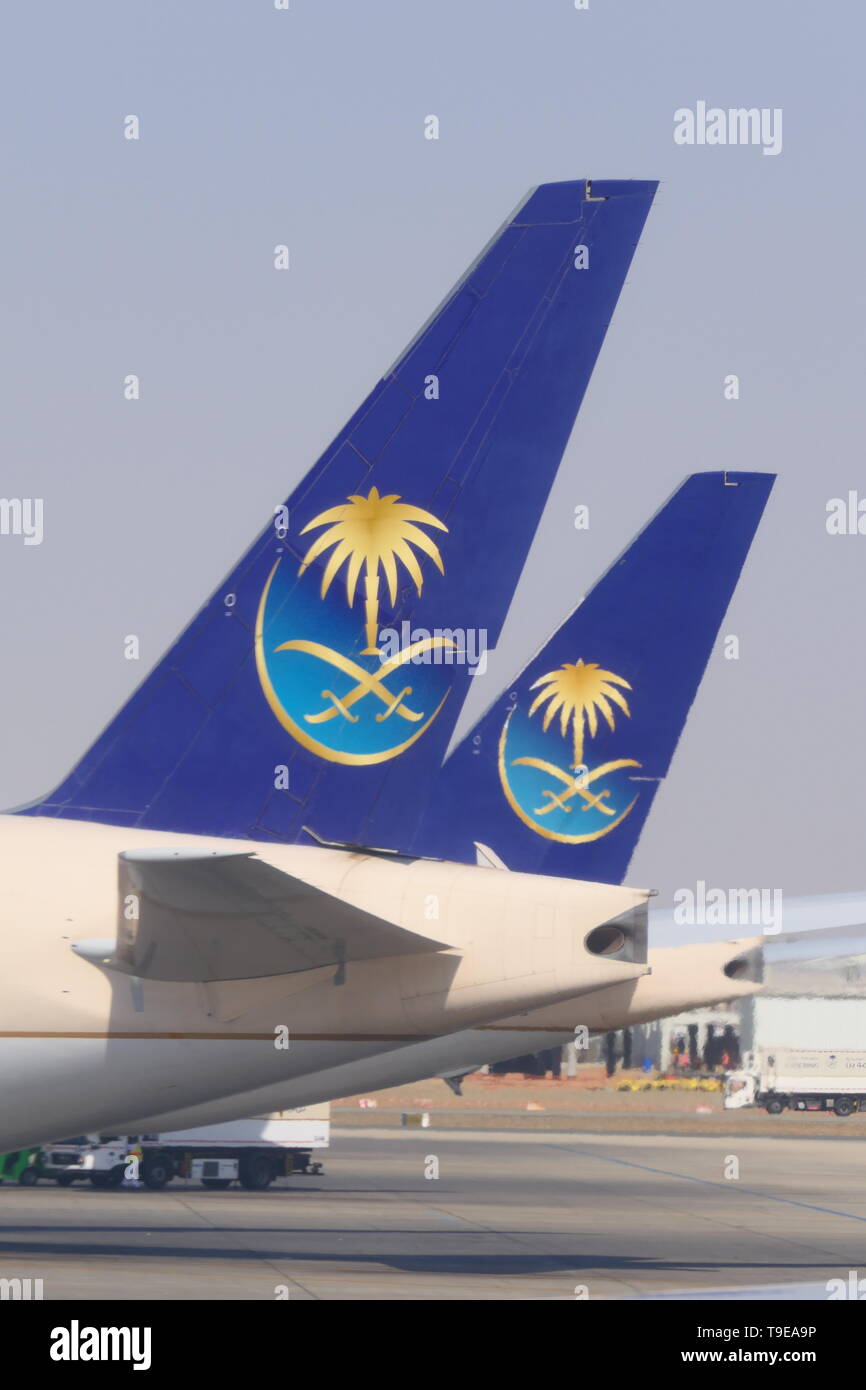 JEDDAH, SAUDI ARABIA - DECEMBER 22, 2018: Two SAUDIA Airplanes on the King Abdulaziz International Airport Stock Photo