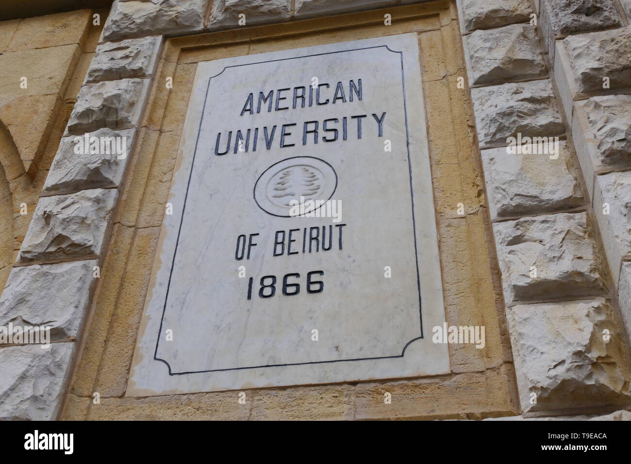 BEIRUT, LEBANON - DECEMBER 23, 2018: The stone Logo of the American University of Beirut, founded in 1866 Stock Photo