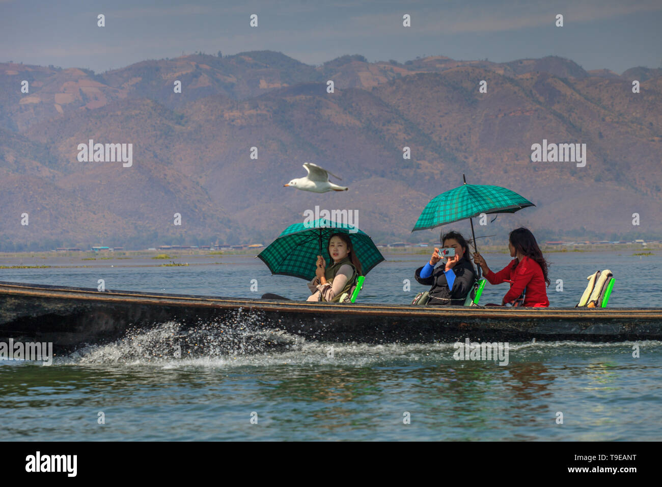 Tourist boat on the Inle lake Stock Photo
