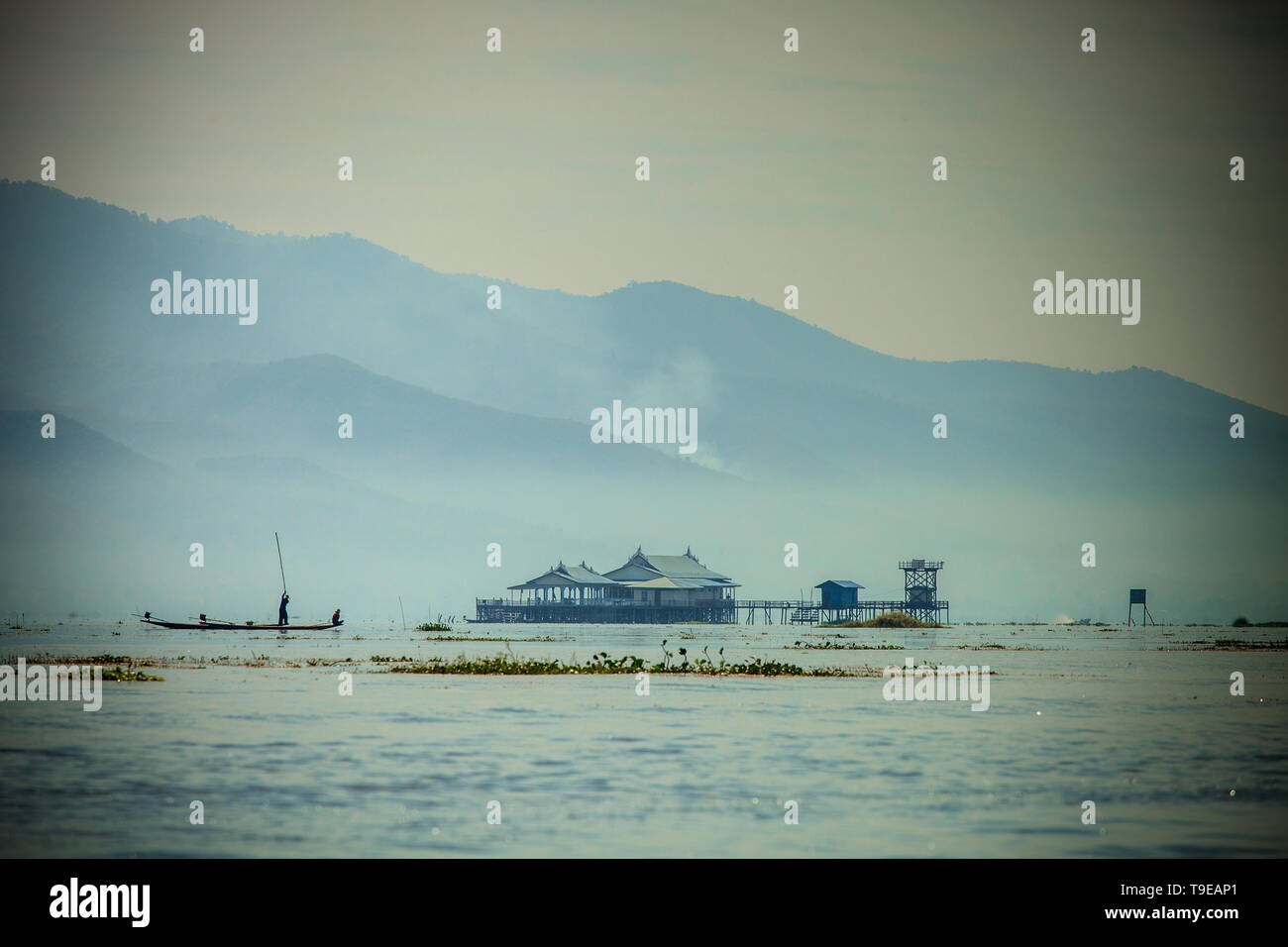 Overview of the Inle Lake with fisherman Stock Photo