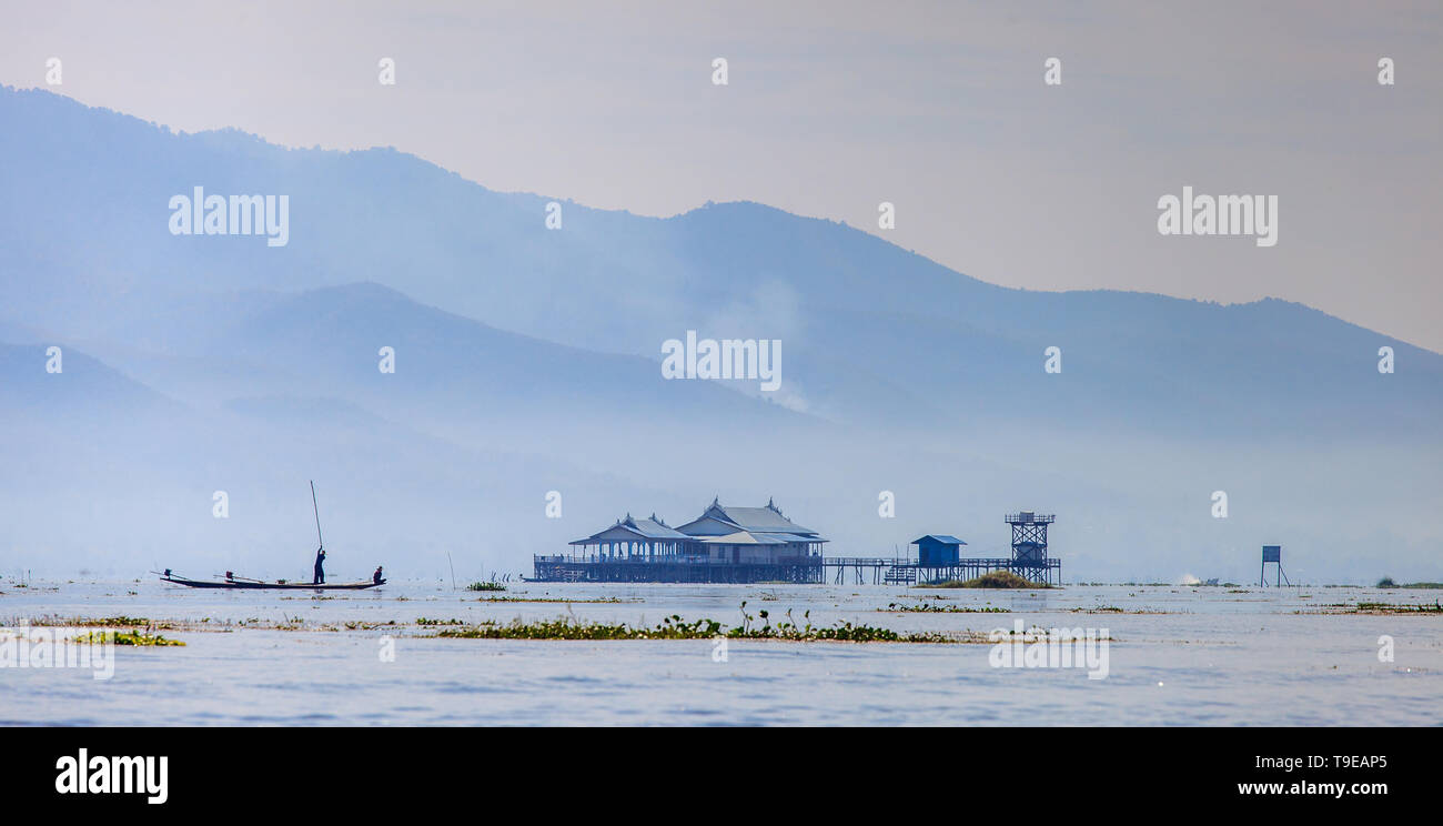 Overview of the Inle Lake with fisherman Stock Photo