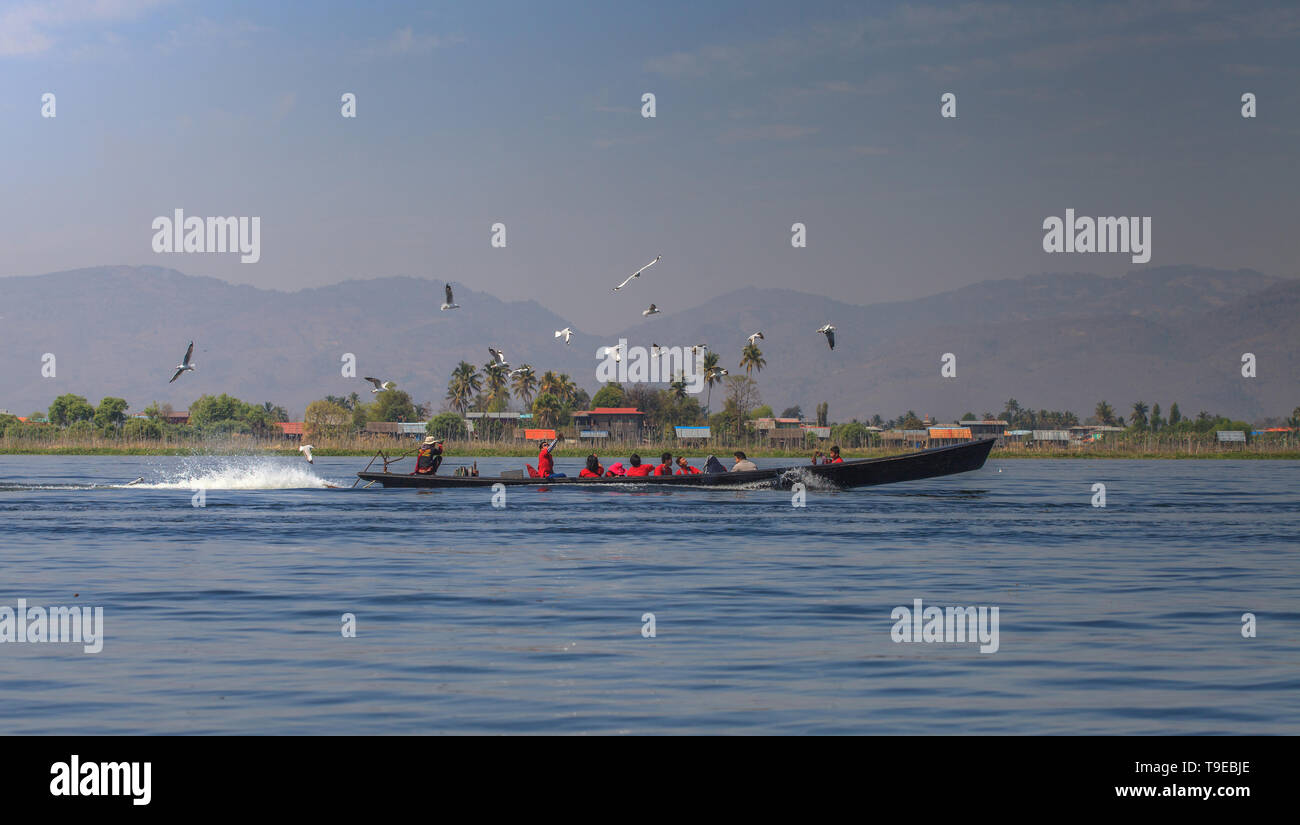 Tourist boat on the Inle lake Stock Photo