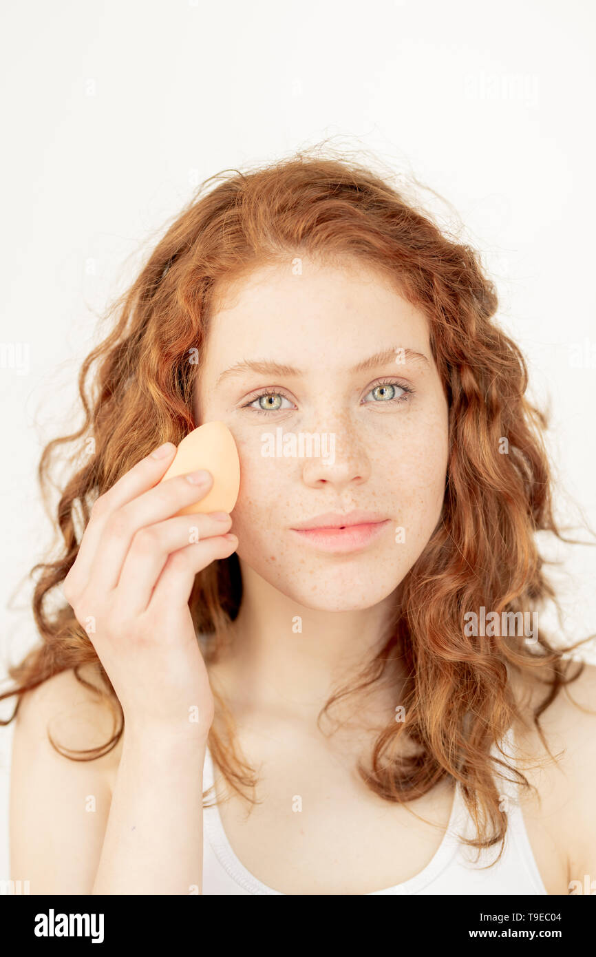 Washing face with sponge Stock Photo Alamy