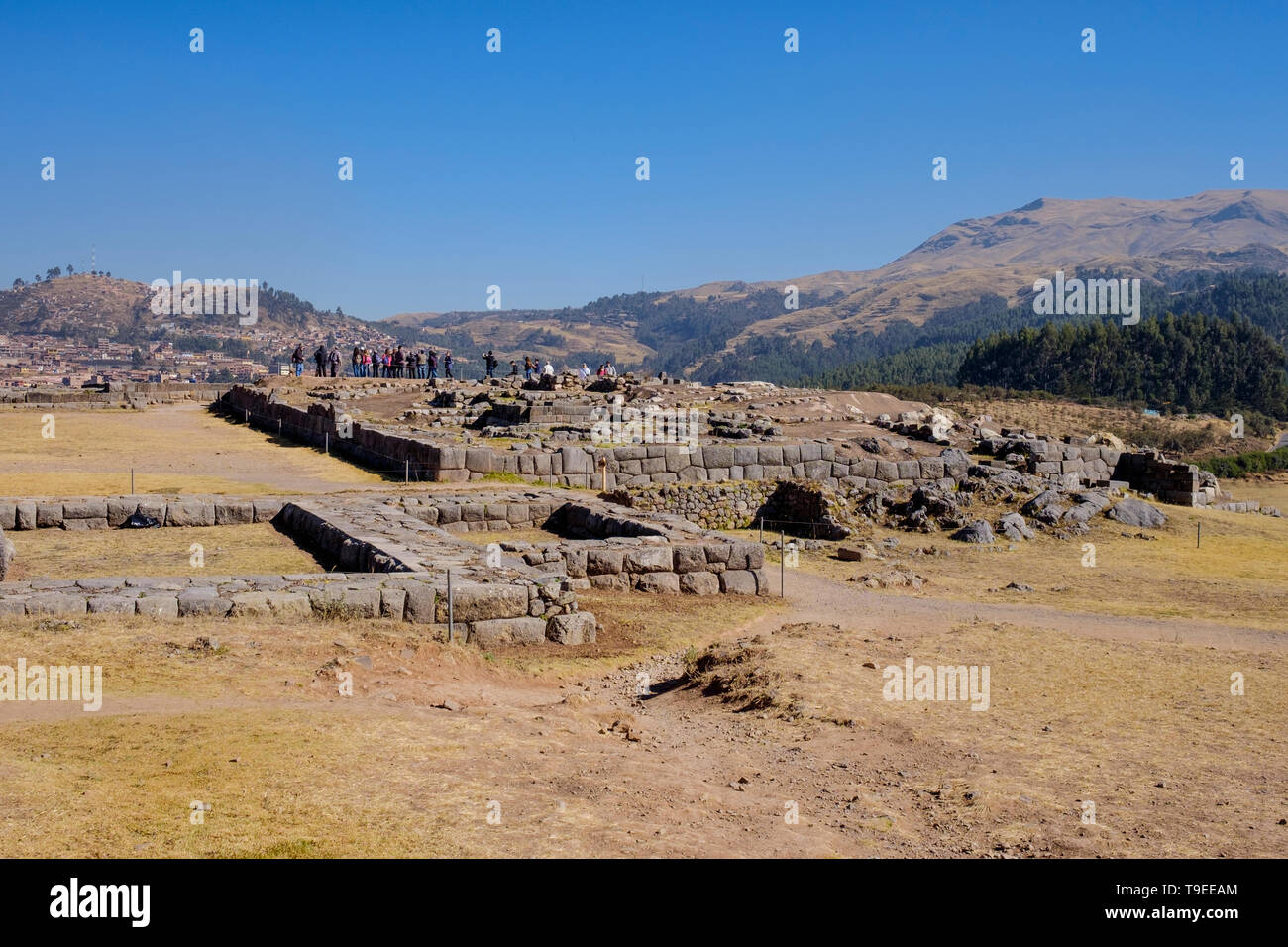 Visitors on Mayuq Marka at Saqsaywaman archeological site near Cusco, Peru Stock Photo