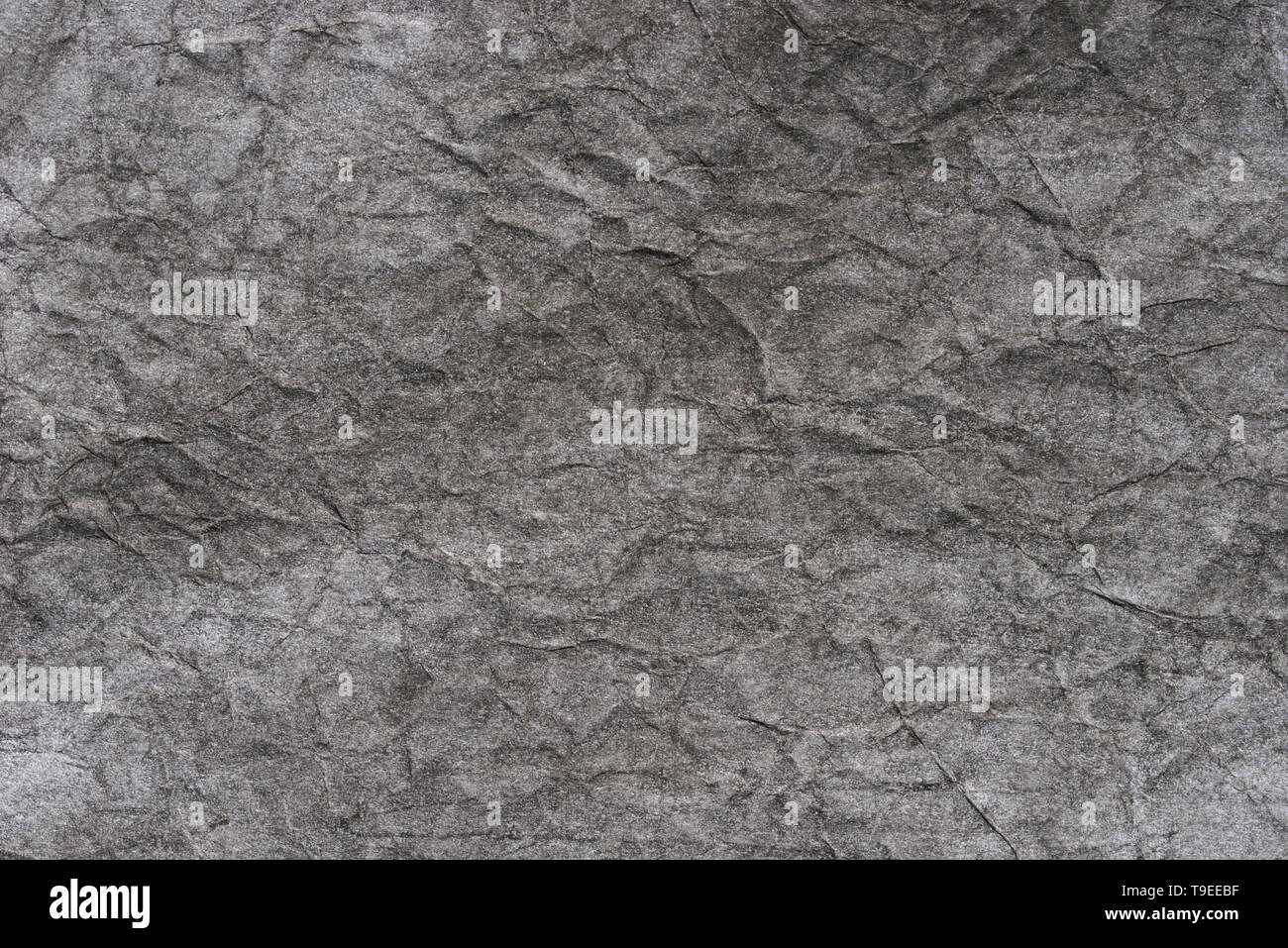 black color creased pastel paper background texture Stock Photo - Alamy