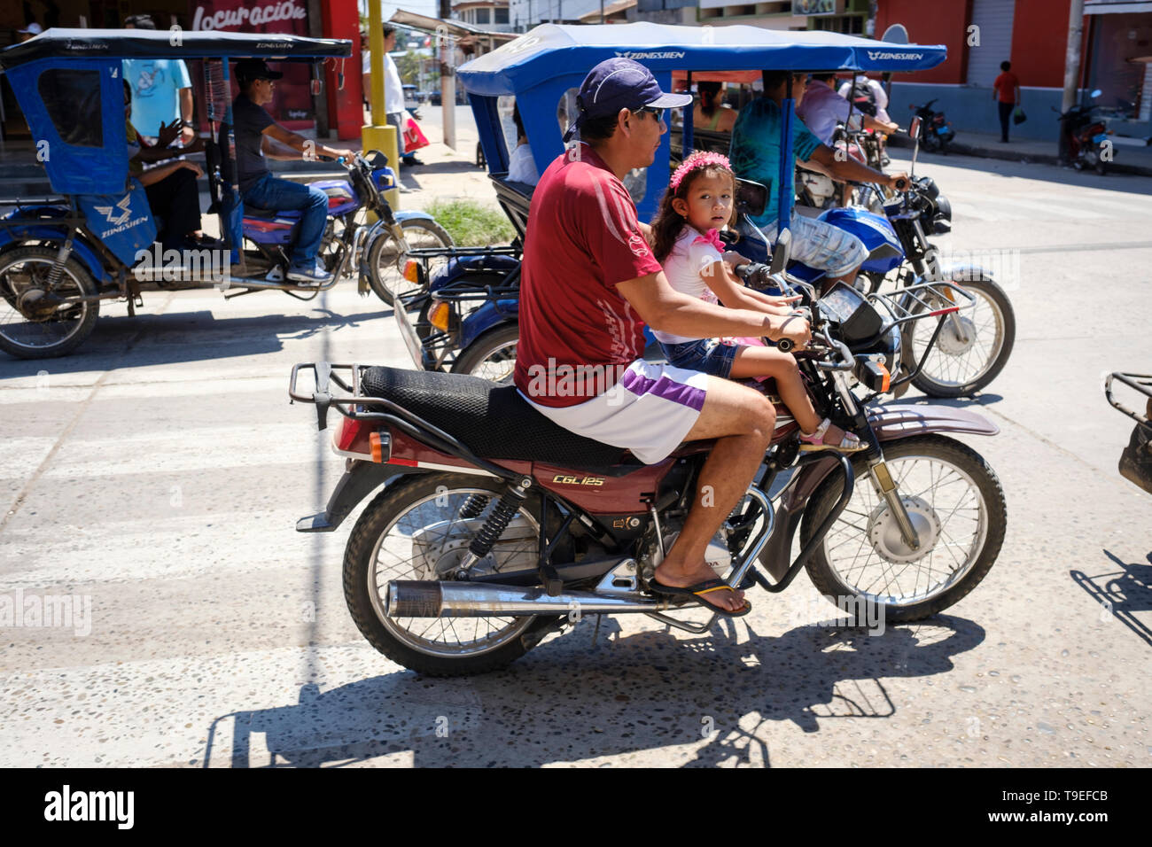 little girl riding motorcycle