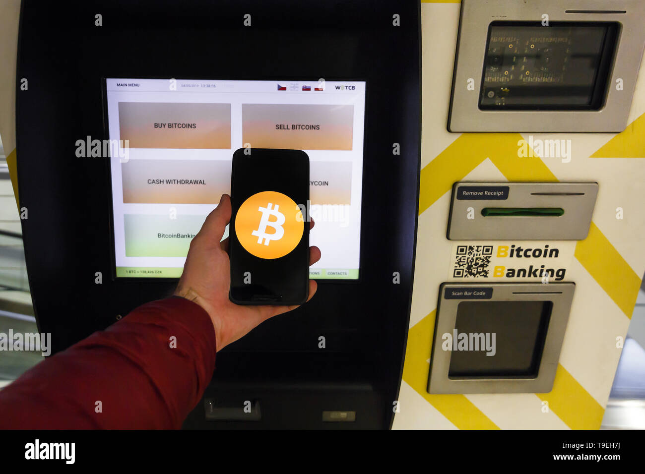 Prague Czech Republic May 18th 2019 Bitcoin Atm Machine For - prague czech republic may 18th 2019 bitcoin atm machine for buying and selling cryptocurrency male sells bitcoins by atm using smartphone prague