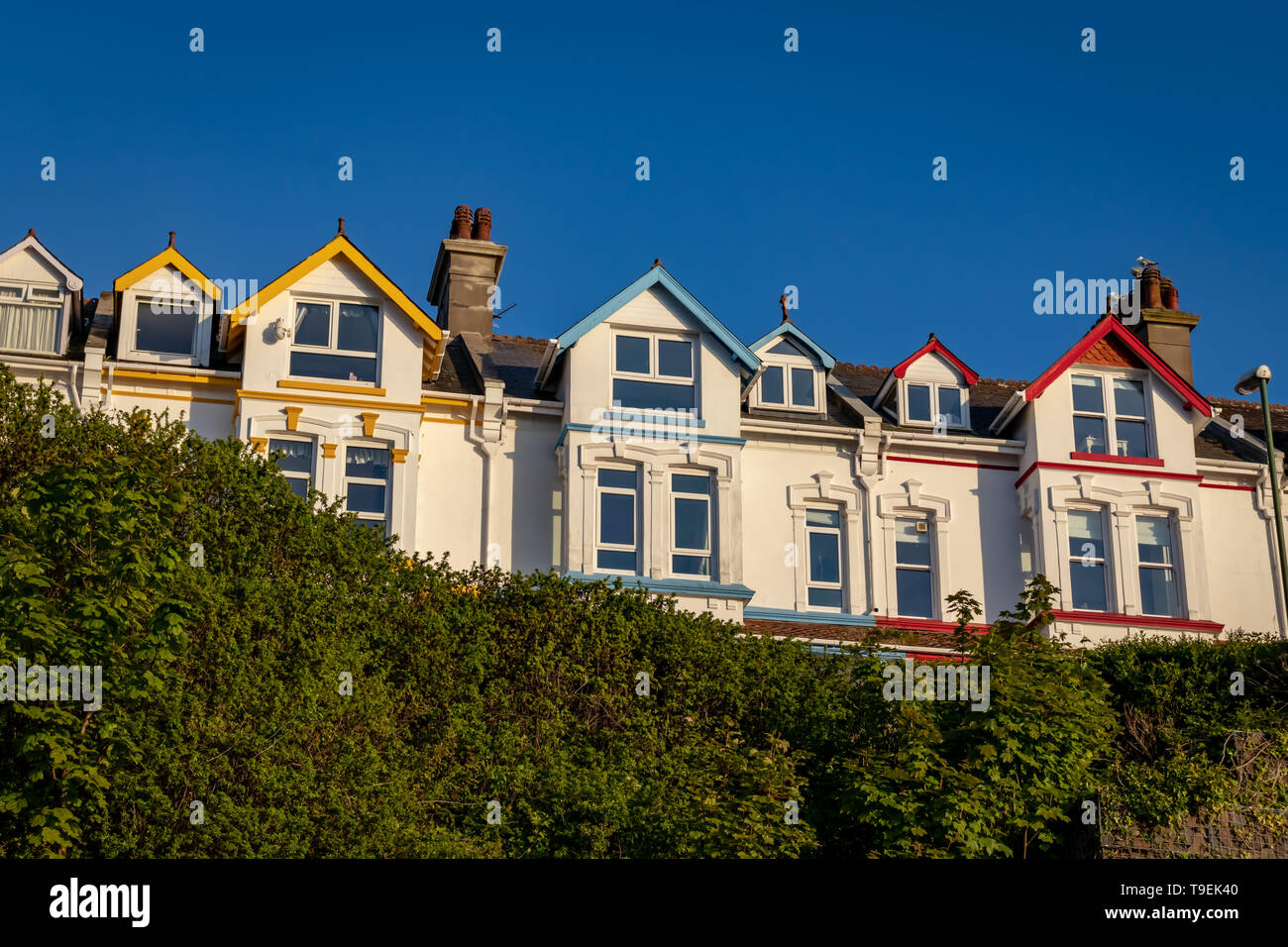 Bright Colourful Houses Overlooking Brixham Harbour and Marina,Torbay,Devon.England Stock Photo
