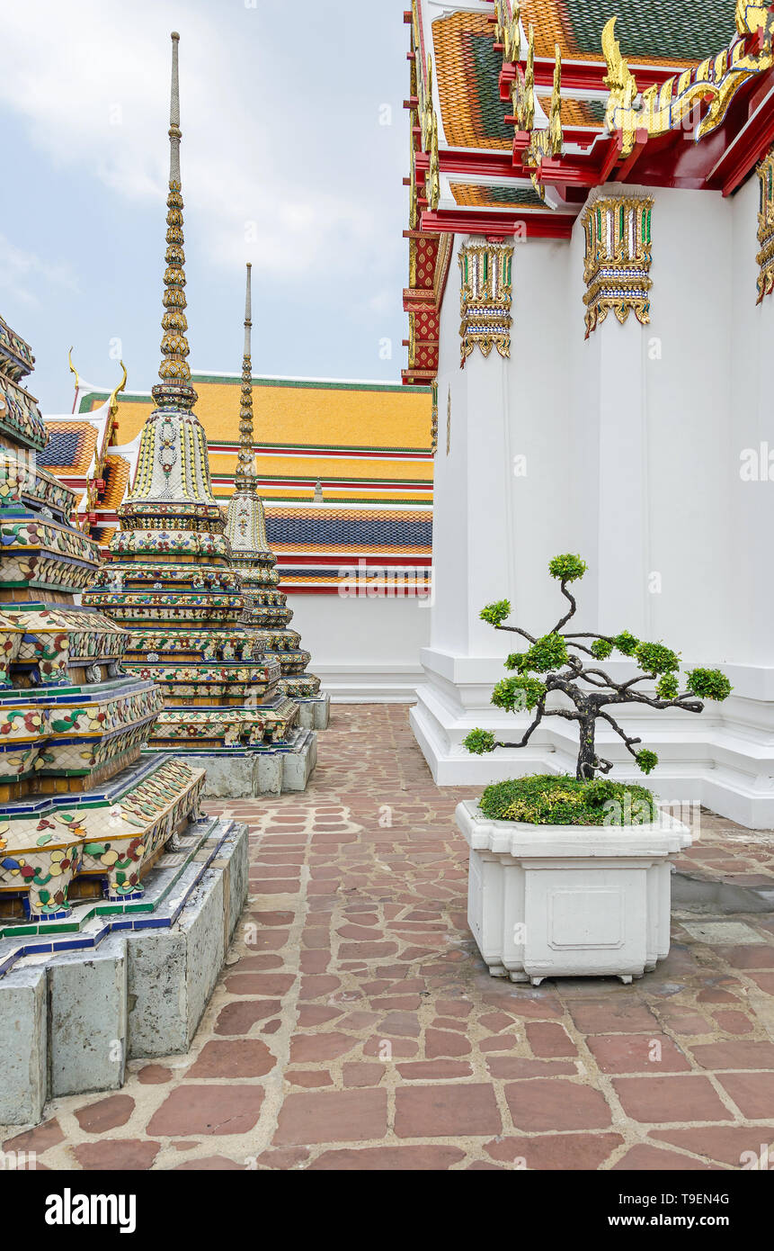 Pavilions and chedis, called Phra Chedi Rai, which contain the ashes of members of the royal family,  in a Buddhist temple complex Wat Pho also known  Stock Photo