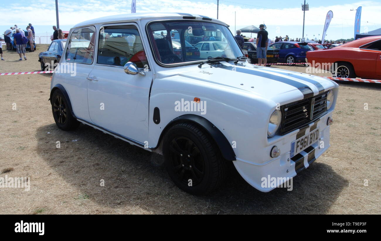 An Austin Mini 1100 parked up on display at the Riviera classic car show, Paignton, Devon, England. UK. Stock Photo
