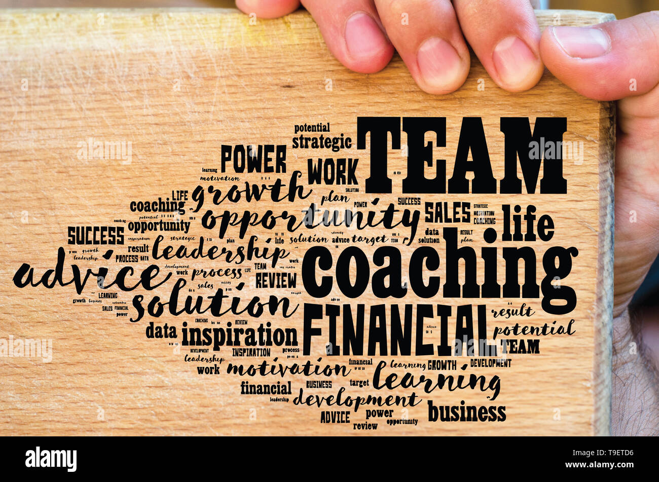 Team word cloud collage over wooden background Stock Photo