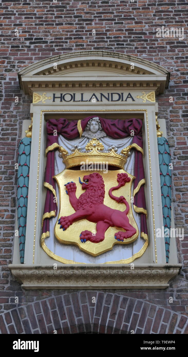 The official Hollandia coat of arms on a historic building in The Hague, The Netherlands Stock Photo