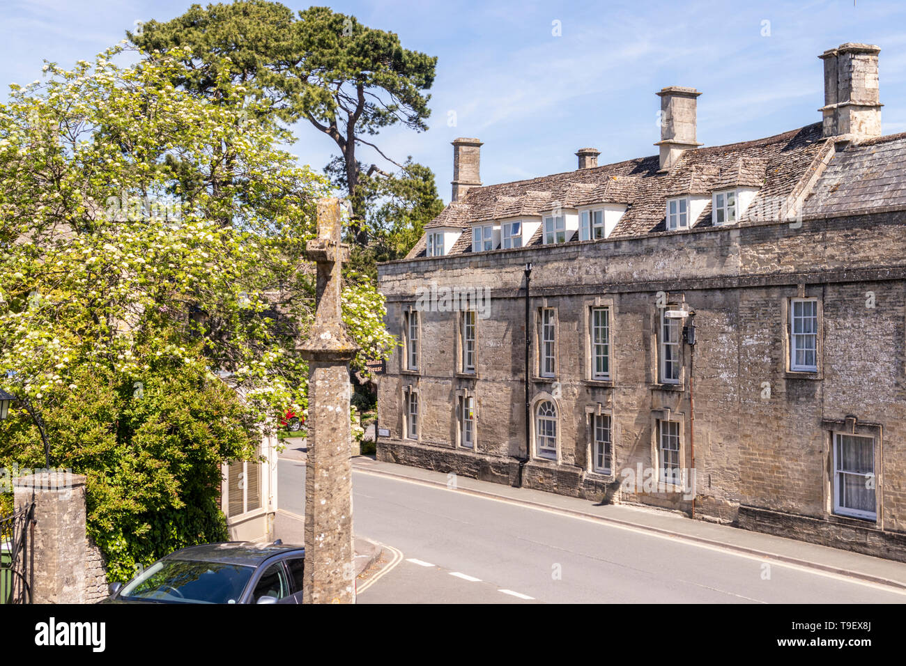 Old stone houses in the Market Place in the ancient Cotswold town of Northleach, Gloucestershire UK Stock Photo