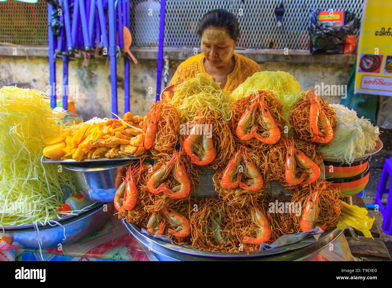 Woman selling shrimp at the market (Yangoon) Stock Photo