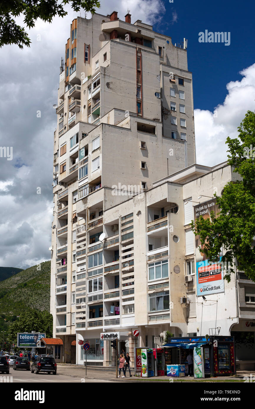 Apartment building at Mostar, in the brutalism architectural style. Brutalism was very popular in the Eastern Europ from middle sixties to eighties. Stock Photo