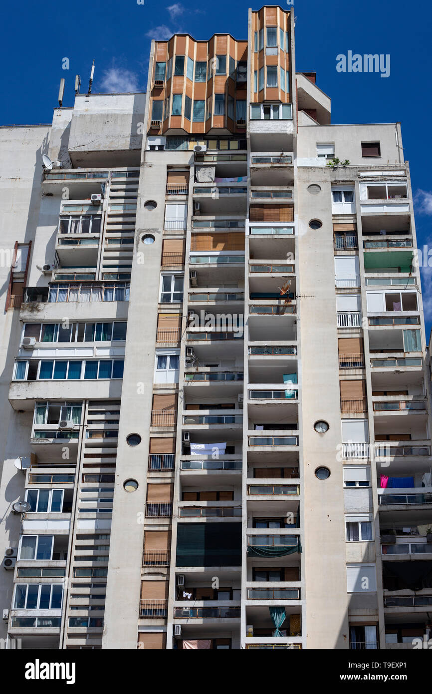 Block of flats at Mostar, in the brutalism architectural style. Brutalism was very popular in Eastern Europ from the middle sixties to the eighties. Stock Photo