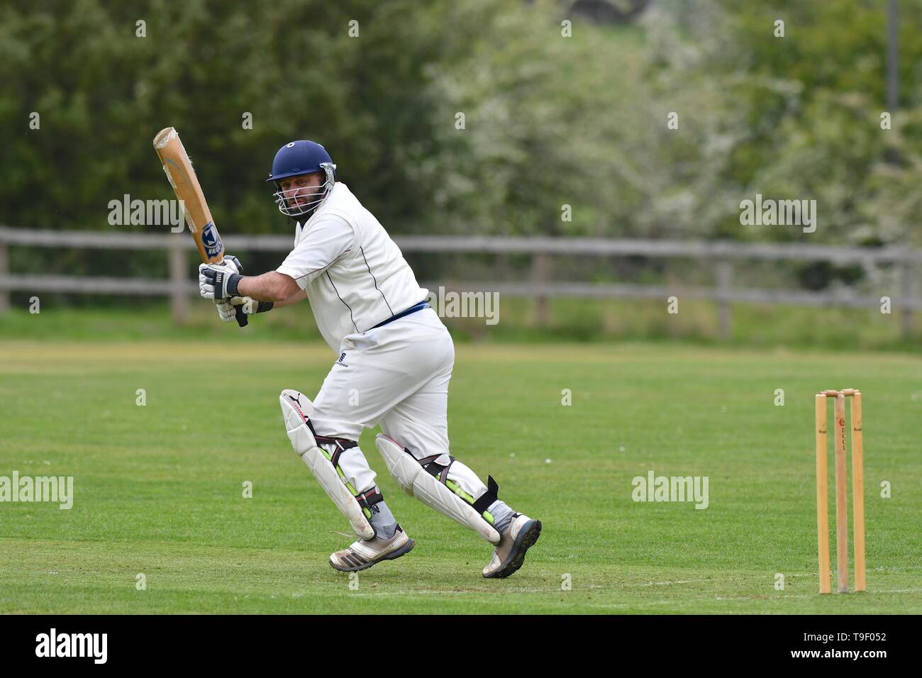 A batsman in action during the Derbyshire and Cheshire League match between Birch Vale and Thornsett, and Hazel Grove. Stock Photo