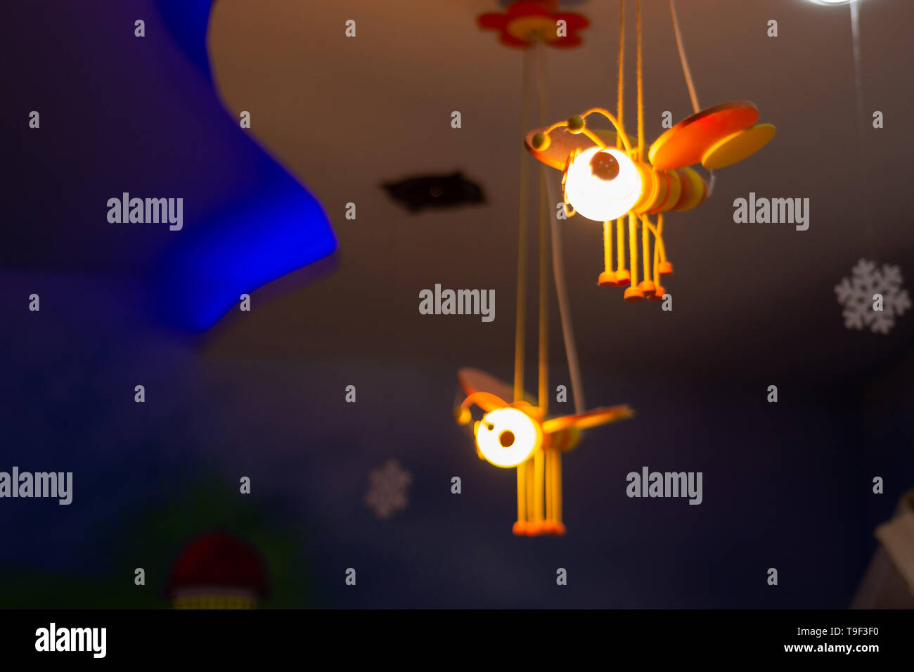 Bees Light Toys And Decoration Hanging On The Ceiling At Home At