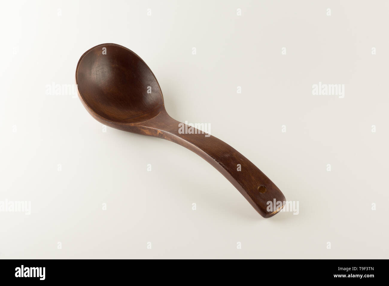 the big wooden spoon of brown color for jam Stock Photo - Alamy