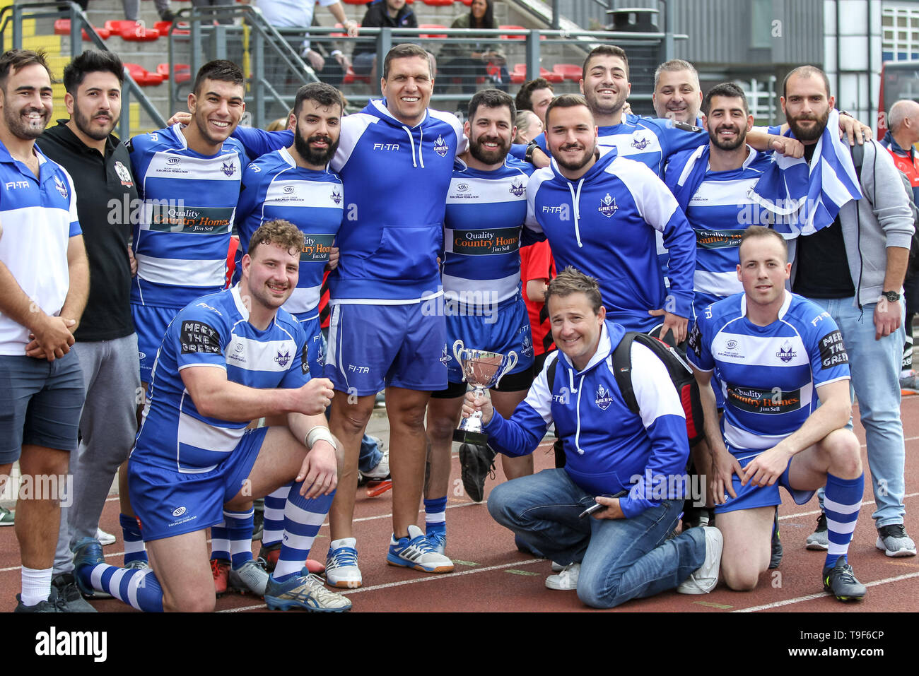 The Greek team celebrate the victory during the Rugby League World Cup