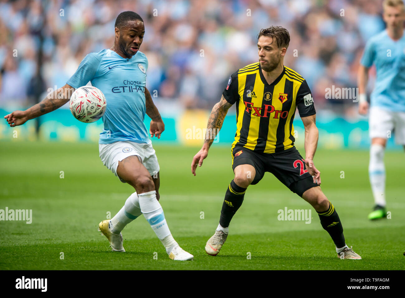 Kiko Femenía of Watford and Raheem Sterling of Manchester City during The FA Cup Final match between Manchester City and Watford at Wembley Stadium, London, England on 18 May 2019. Photo by Salvio Calabrese.  Editorial use only, license required for commercial use. No use in betting, games or a single club/league/player publications. Stock Photo