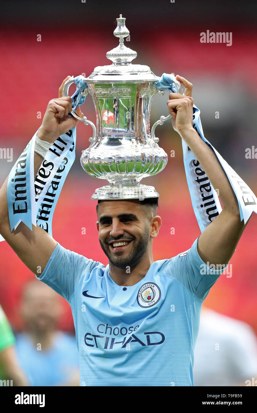London, England 18th May Manchester City midfielder Riyad Mahrez celebrates with the trophy during the FA Cup Final between Manchester City and Watford at Wembley Stadium, London on Saturday 18th May 2019. (Credit: Jon Bromley | MI News) Credit: MI News & Sport /Alamy Live News Stock Photo