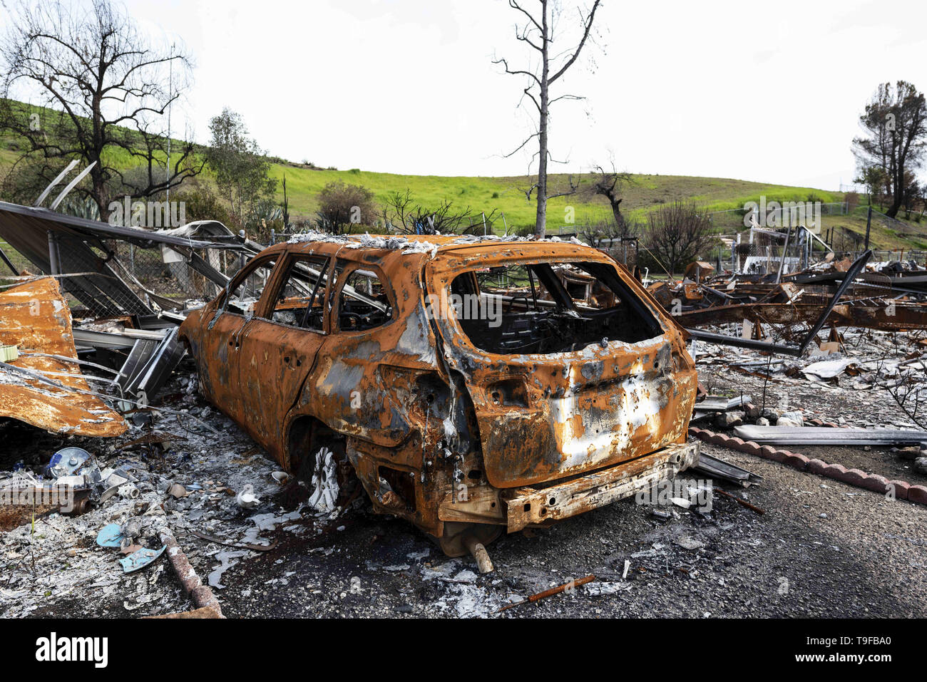 Agoura Hills, CA, USA. 11th Mar, 2019. A burned car is seen in the aftermath of the deadly Woolsey wid fire in Agoura Hills, California.Thousands of fire fighters battled the 2018 Woolsey brush fire in southern California as tens of thousands of people were under mandatory evacuation. 1500 destroyed - 341 damaged, structures were destroyed and damaged, 3 fire fighters were injured and 3 civilian fatalities encountered. The cause of the fire is still uncertain. Credit: Ronen Tivony/SOPA Images/ZUMA Wire/Alamy Live News Stock Photo