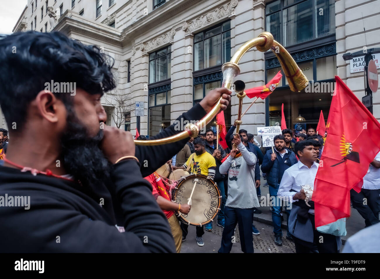 London, UK. 18th May 2019. The band prepare for the march by several thousand Tamils through London on Mullivaikkal Remembrance Day in memory of those killed by Sri Lanka’s genocidal war against the Tamils, which ended ten years ago. They call for a political solution which gives Tamils back control of their homeland of Tamil Eelam, and for an end to the ban on the Tamil Tigers. Public commemorations of the many thousands of war dead are forbidden in Sri Lanka. Peter Marshall/Alamy Live News Stock Photo