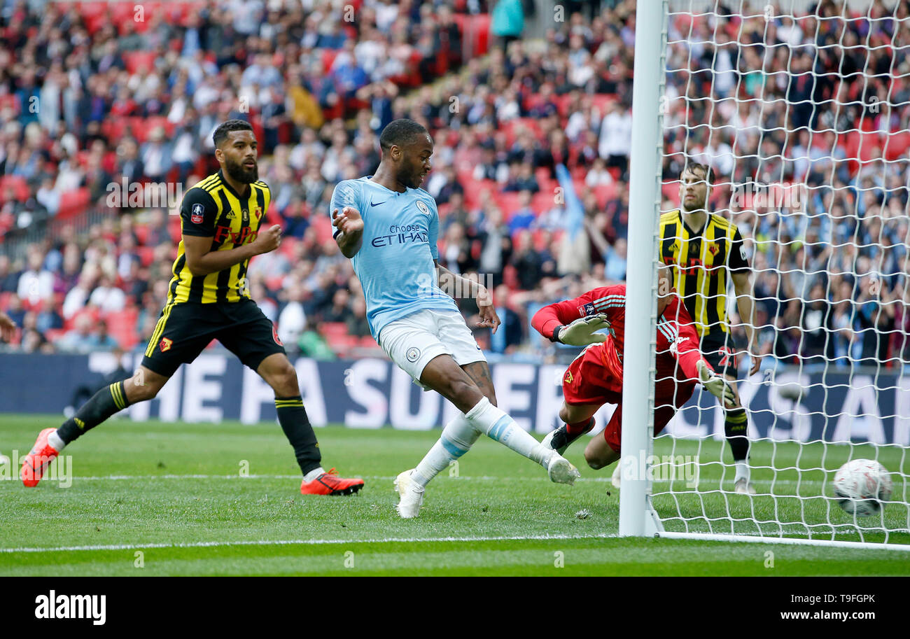 London, UK. 18th May, 2019. Manchester City's Raheem Sterling (C) scores  the sixth goal during the English FA Cup Final between Manchester City and  Watford at Wembley Stadium in London, Britain on
