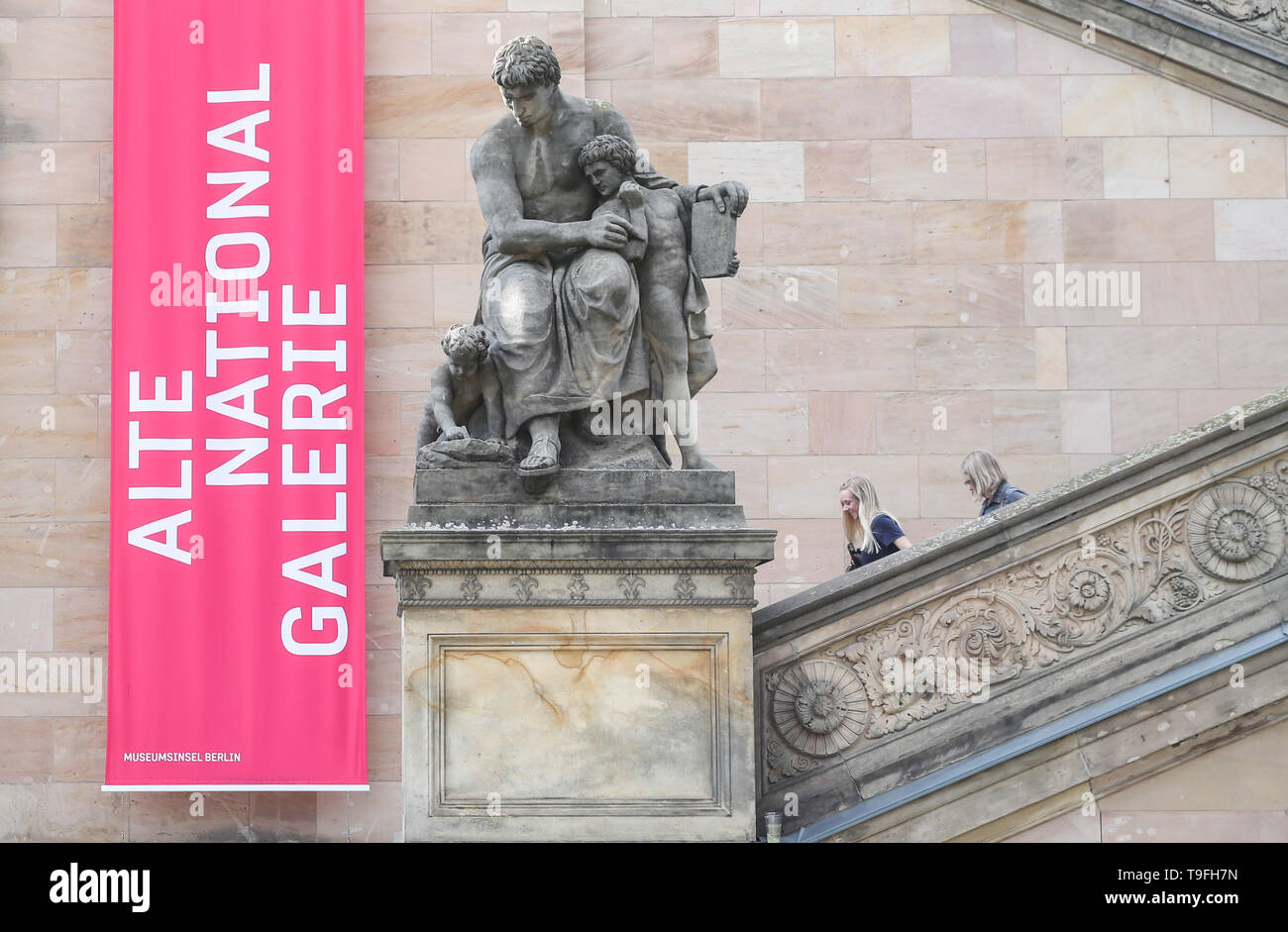 Beijing, Germany. 17th May, 2019. Two visitors walk downstairs outside the Alte Nationalgalerie (Old National Gallery) at Museum Island in Berlin, capital of Germany, on May 17, 2019. Credit: Shan Yuqi/Xinhua/Alamy Live News Stock Photo