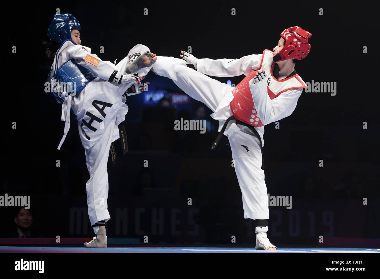 Manchester, UK. 18th May, 2019. China's Wu Jingyu (R) competes against Thailand's Wongpattanakit Panipak in the women's -49kg final at the World Taekwondo Championships 2019 in Manchester, Britain on May 18, 2019. Credit: Jon Super/Xinhua/Alamy Live News Stock Photo