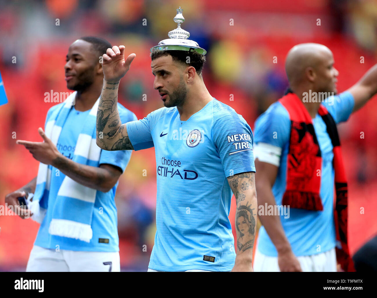 Manchester Citys Kyle Walker celebrates with the FA Cup lid on his head after winning the FA Cup Final at Wembley Stadium, London Stock Photo