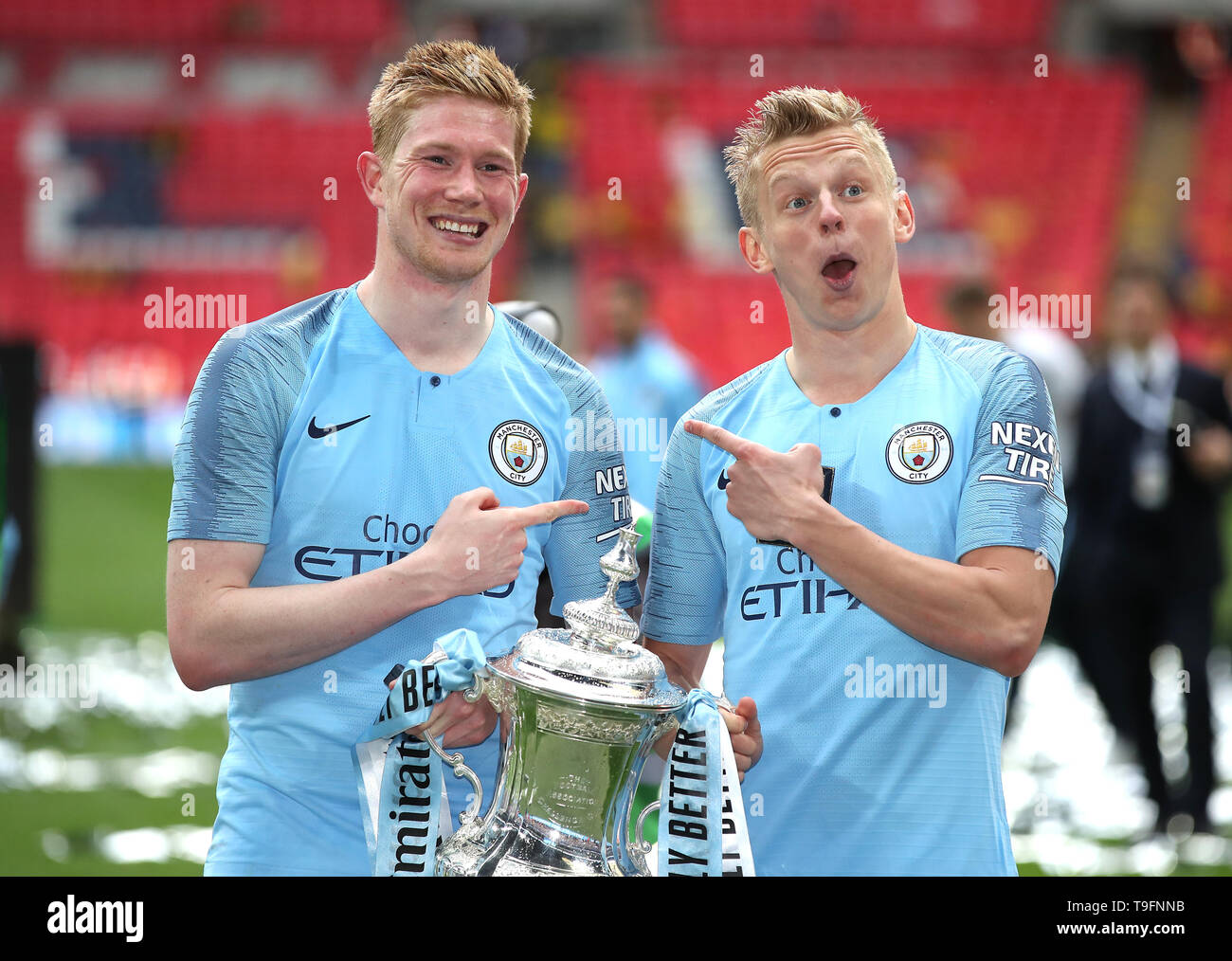 Manchester City's Kevin De Bruyne (left) and Alexander Zinchenko (right) celebrate with the