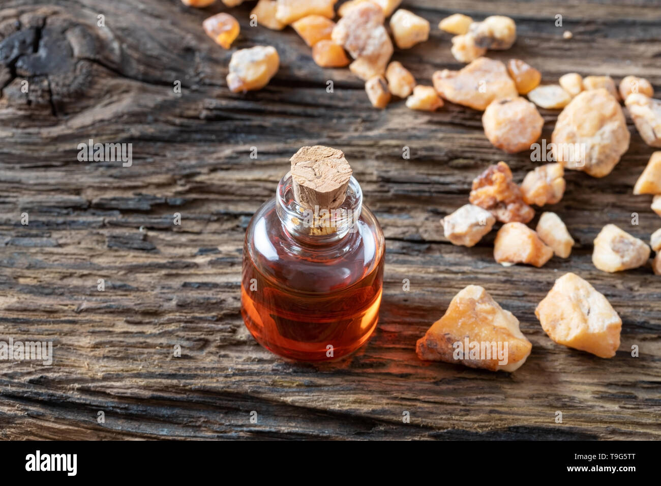 A bottle of styrax benzoin essential oil and resin Stock Photo