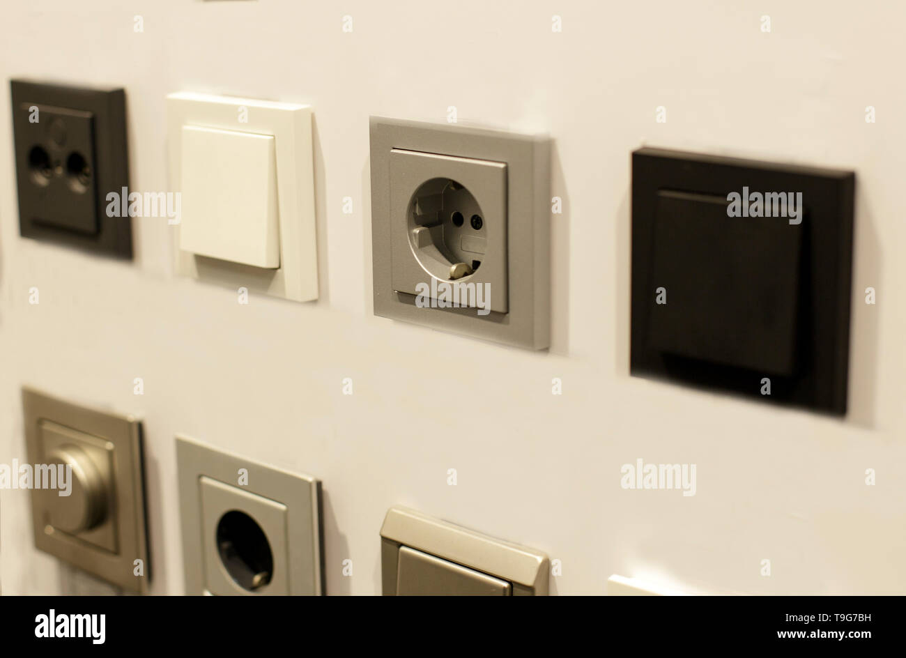 Electrician's equipment. Light switch, socket, outlet Stock Photo - Alamy