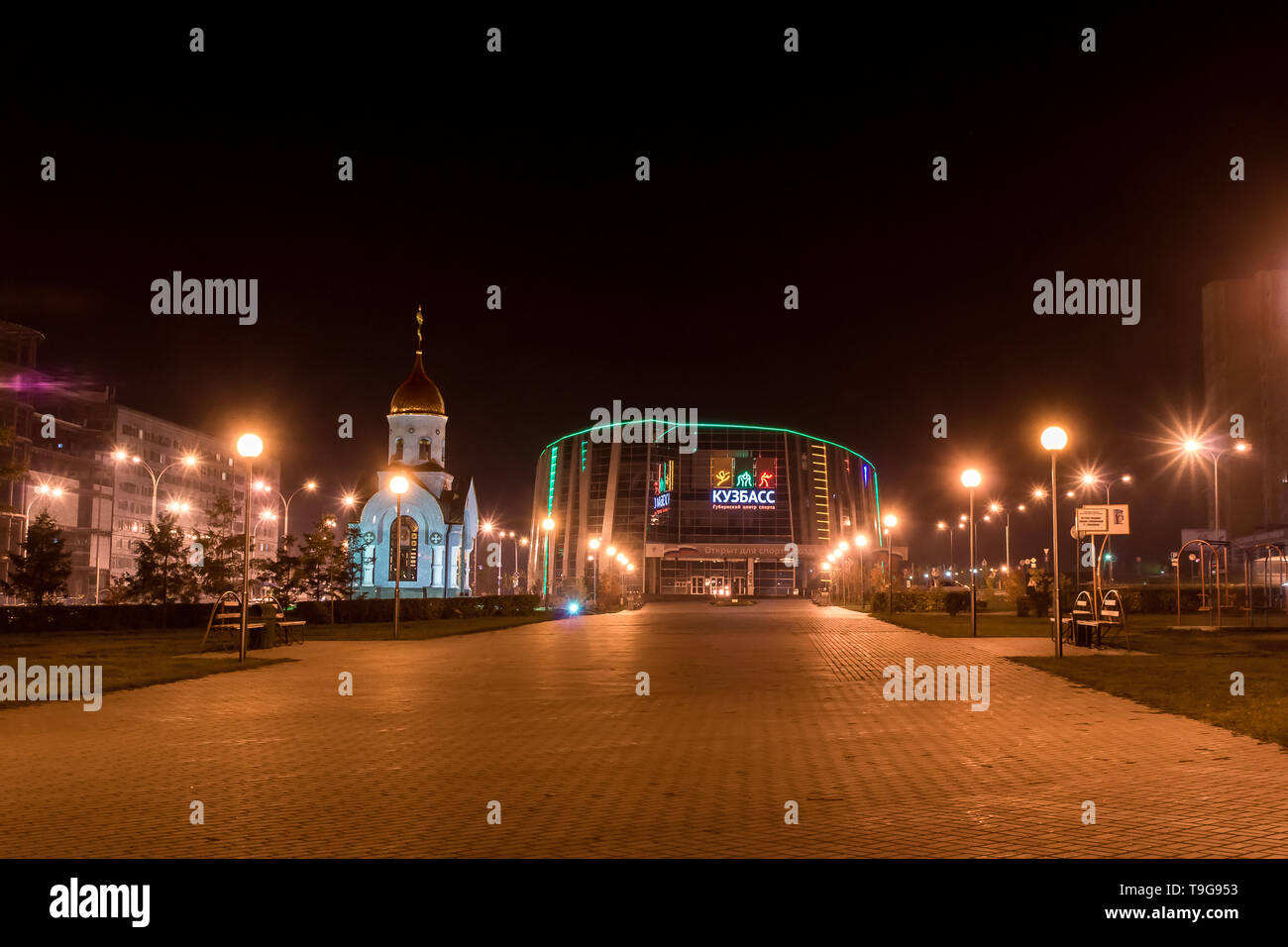 Kemerovo, Russia - 04 october 2014 Provincial sports center Kuzbass and Chapel at night Stock Photo