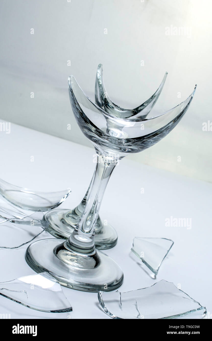 Two Broken Champagne Glasses and shattered glass Stock Photo Alamy