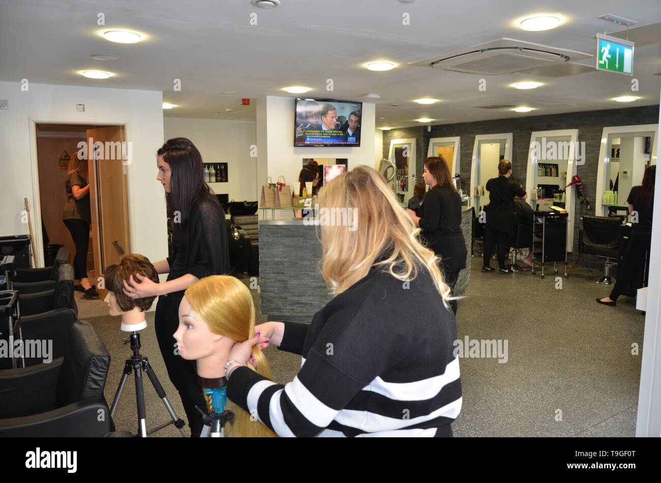 Hair And Beauty Salon Student Hairdresser Training Stock Photo